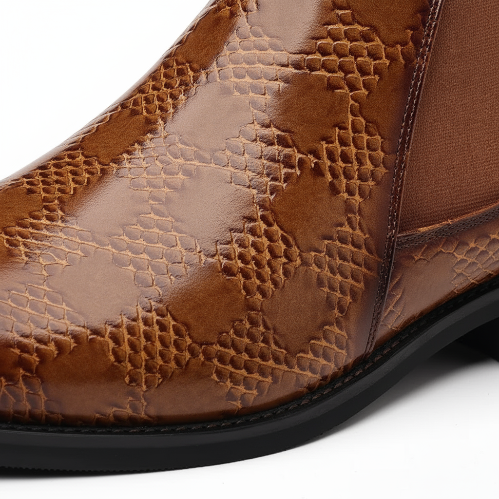 Elegant men's leather Chelsea boots in a polished finish, suitable for both casual and formal occasions.