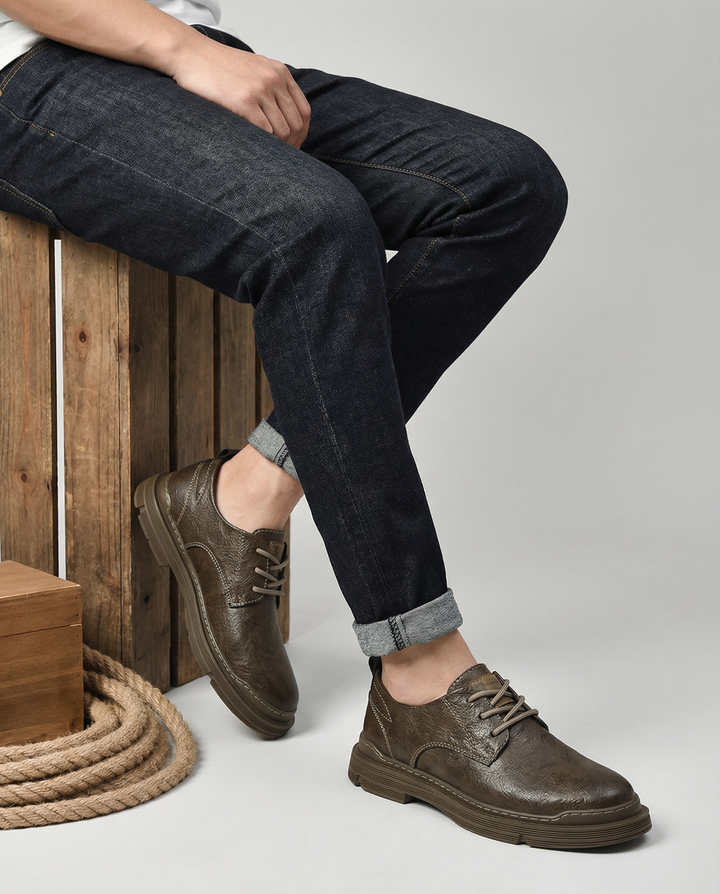 Men's classic oxford-style derby shoes in polished dark brown leather, comfortable fit