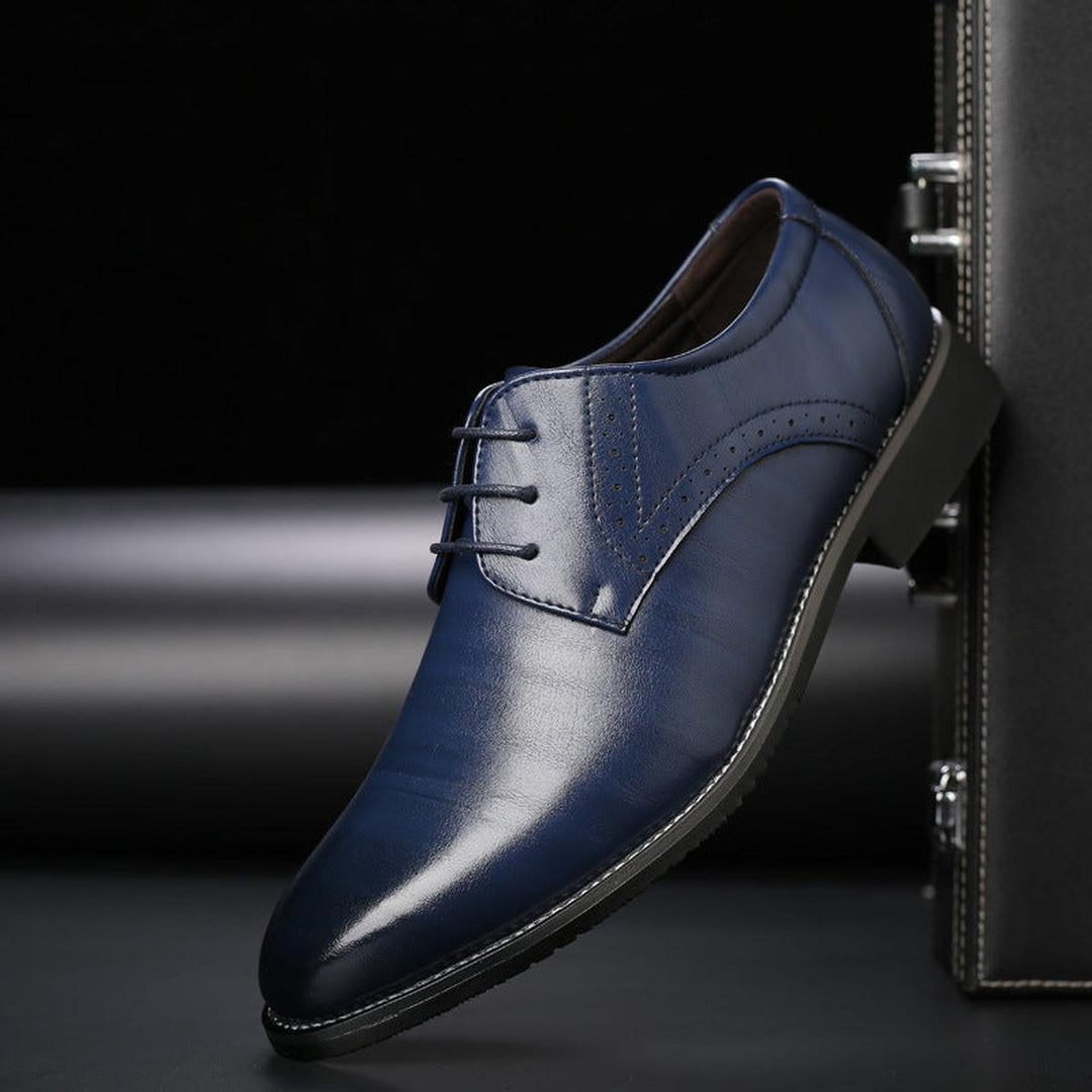 Elegant men's black leather formal lace-up dress shoes, ideal for a refined and professional look.