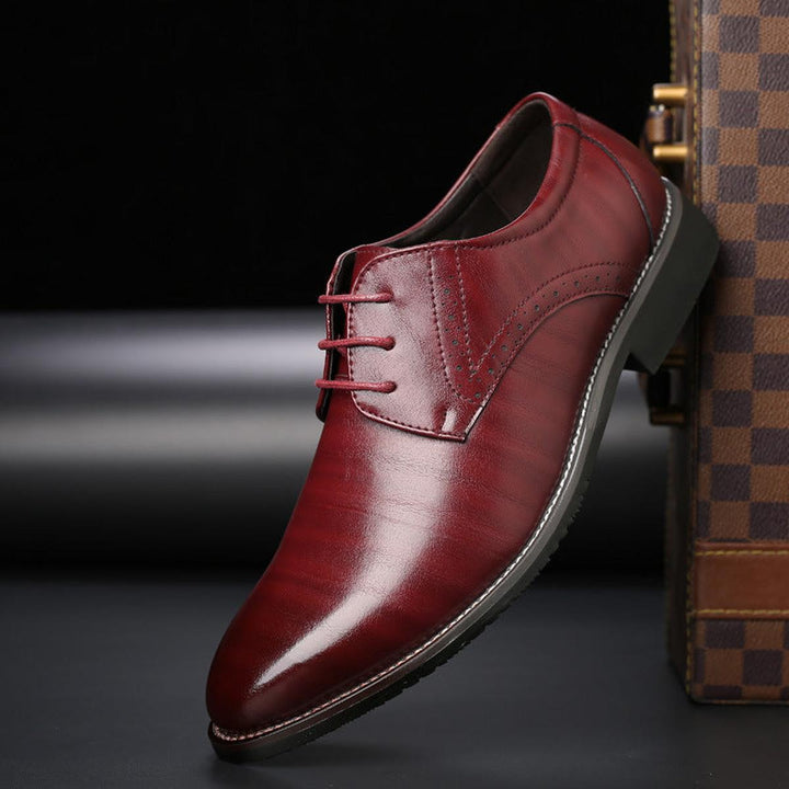 Stylish men's formal lace-up dress shoes in dark brown, offering sophisticated business footwear.