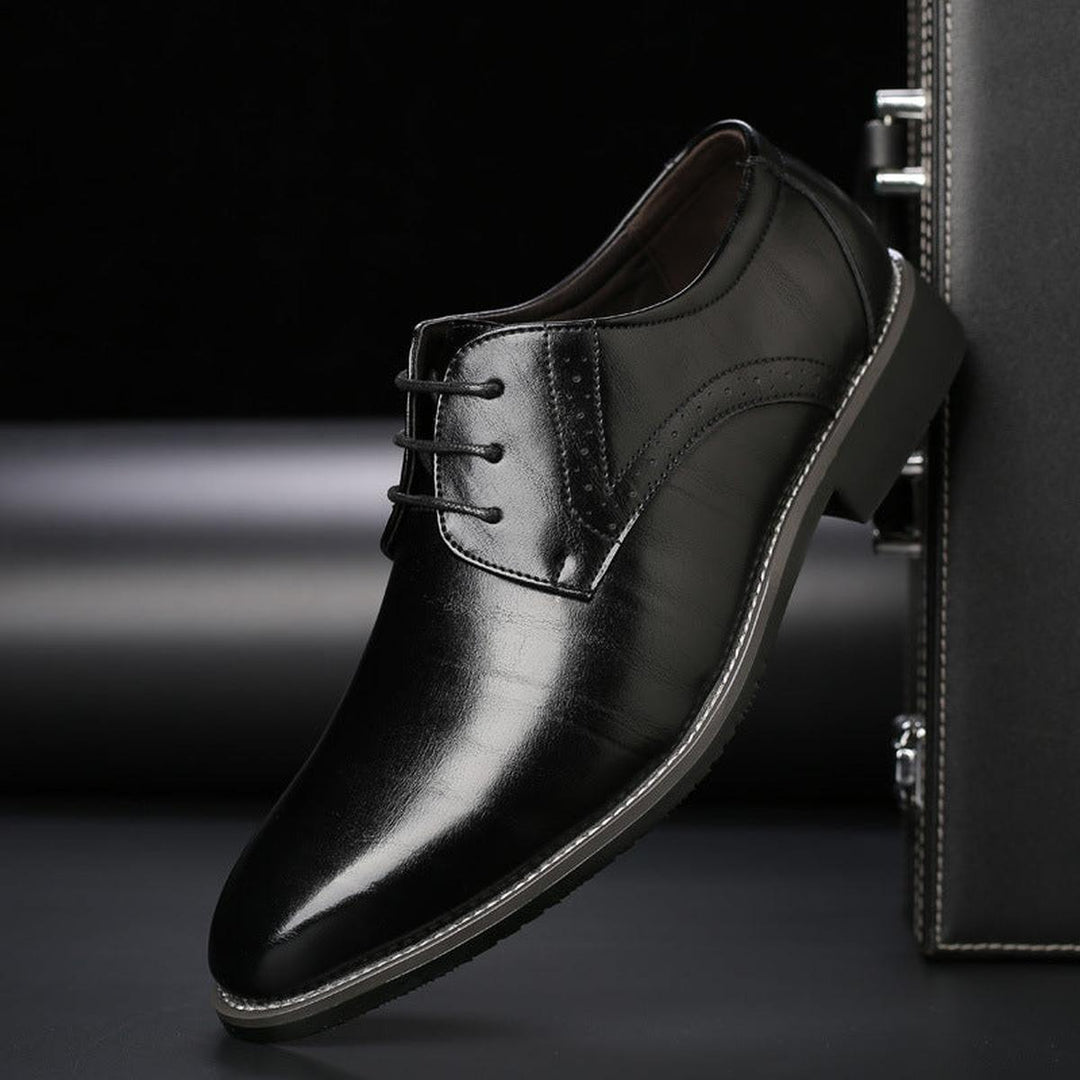 Men's classic lace-up dress shoes with a polished finish, essential formal footwear for men.