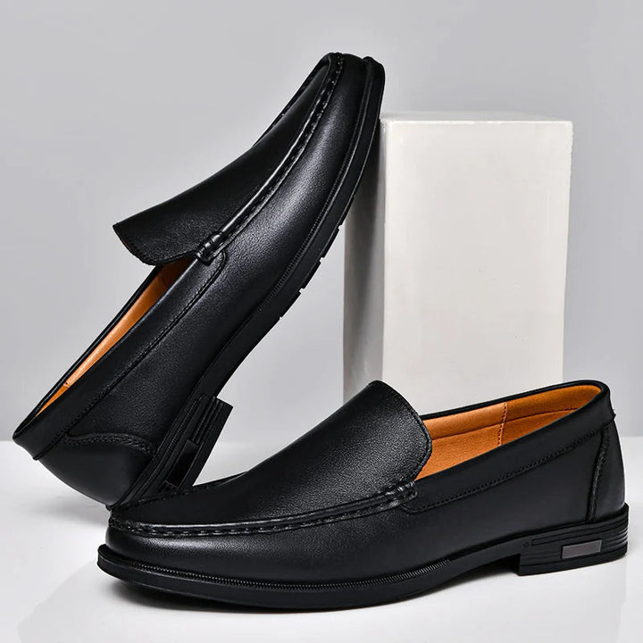 Men's classic tan leather loafers, comfortable slip-on formal shoes for business or casual wear.