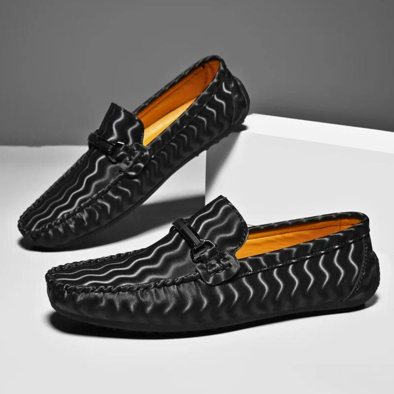 Men's classic tan leather loafers, comfortable slip-on dress shoes for formal or casual wear.