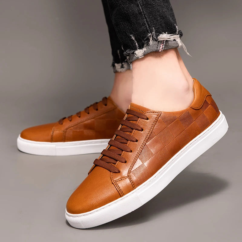 Side profile of men's premium leather low-top sneakers, emphasizing sleek design and comfort features