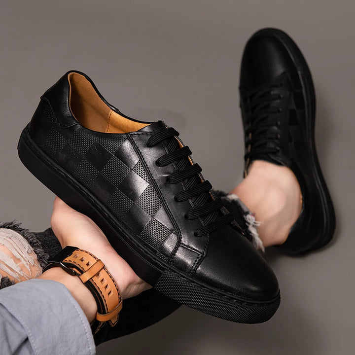 Men's casual leather low-top sneakers in a rich burgundy color, perfect for adding a pop to outfits