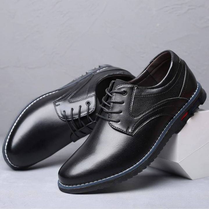 Men's classic tan leather oxford dress shoes, perfect for professional or formal wear, with a comfortable fit.