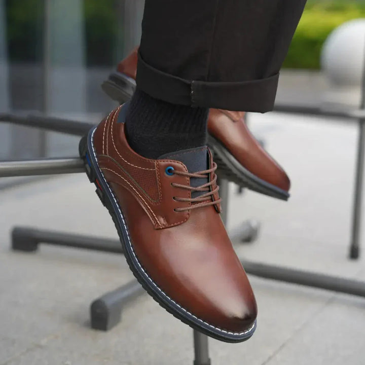 Men's leather dress shoes in a classic brown hue, featuring a comfortable sole for all-day wear.