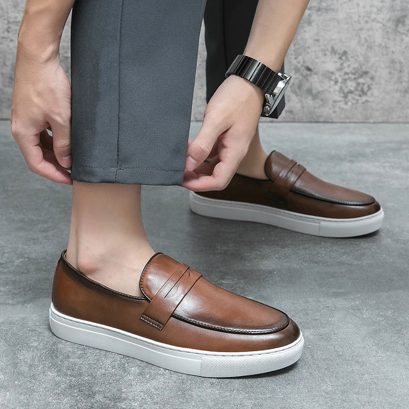 Elegant men's penny loafers crafted from premium leather, a timeless footwear choice.