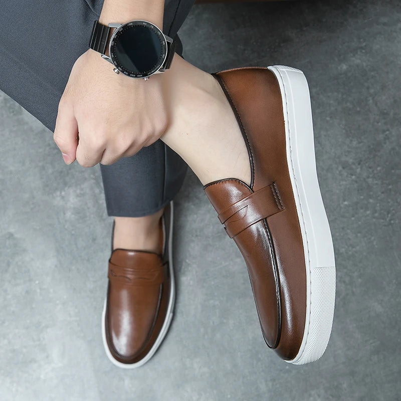 Stylized shot of men's leather loafers, emphasizing their role in a polished wardrobe.