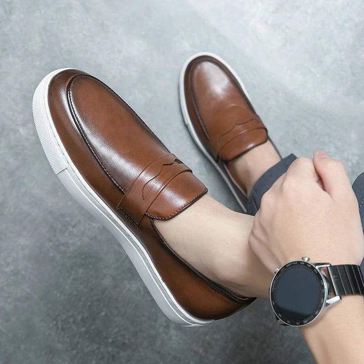 Men's casual leather loafers, providing a sophisticated yet relaxed footwear option.