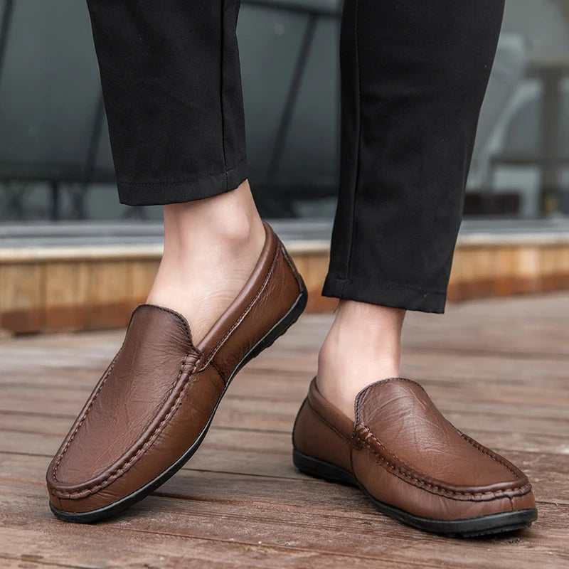 Men's versatile everyday leather slip-on loafers in a warm tan color, easy to wear.