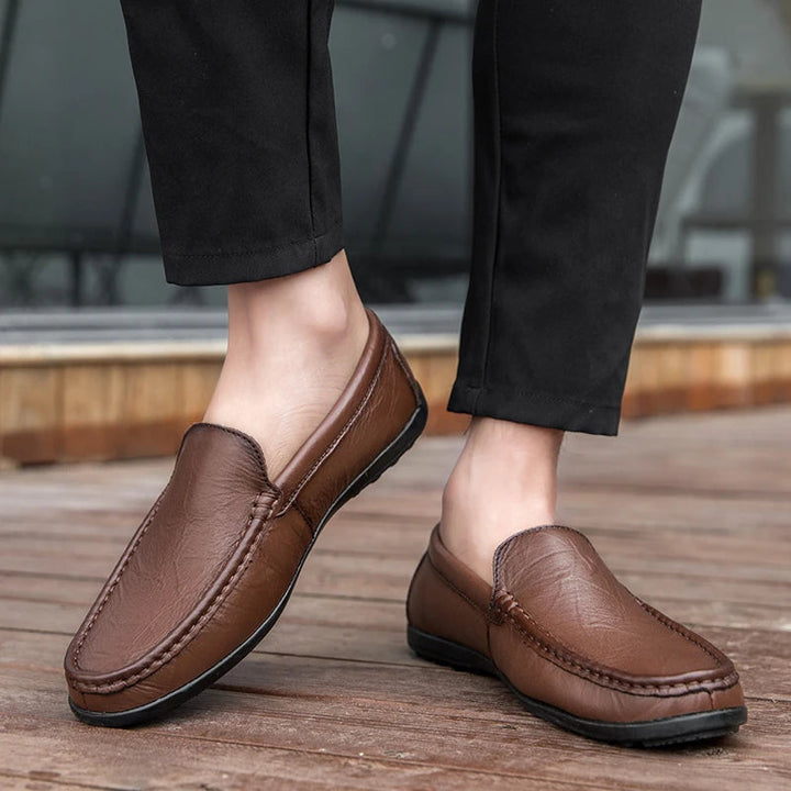 Men's versatile everyday leather slip-on loafers in a warm tan color, easy to wear.