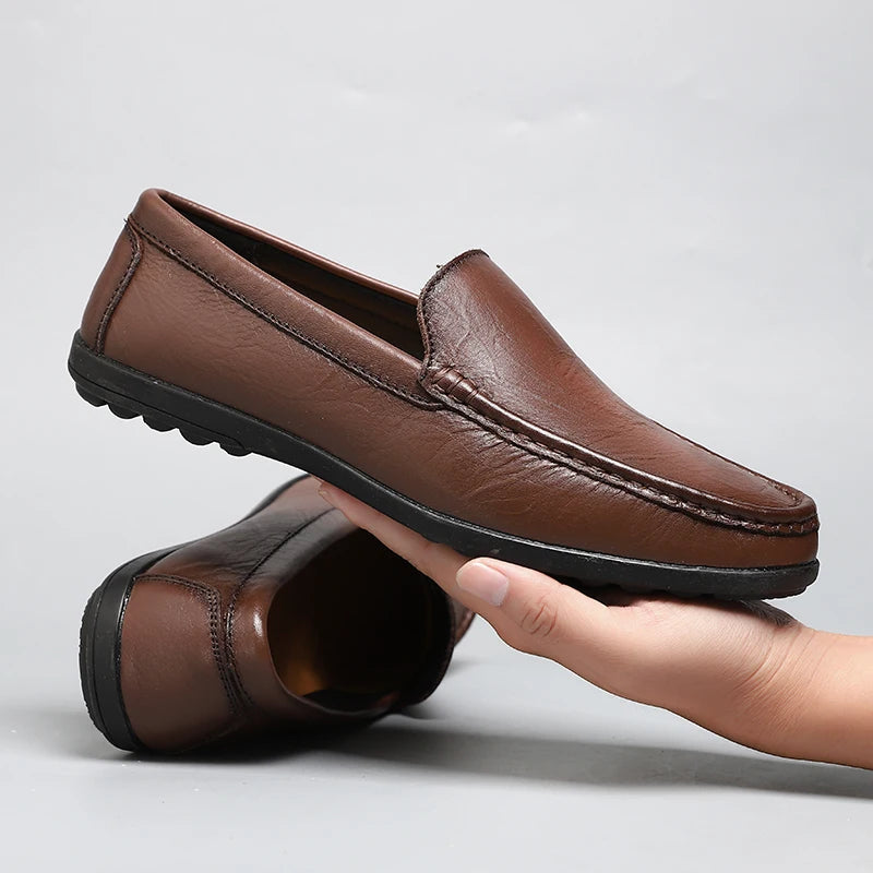 Classic men's leather slip-on loafers, designed for ultimate comfort and sophisticated style.