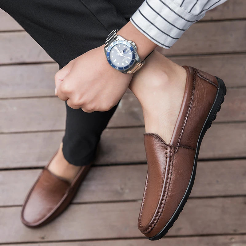High-angle shot of men's premium leather slip-on loafers, showcasing craftsmanship.