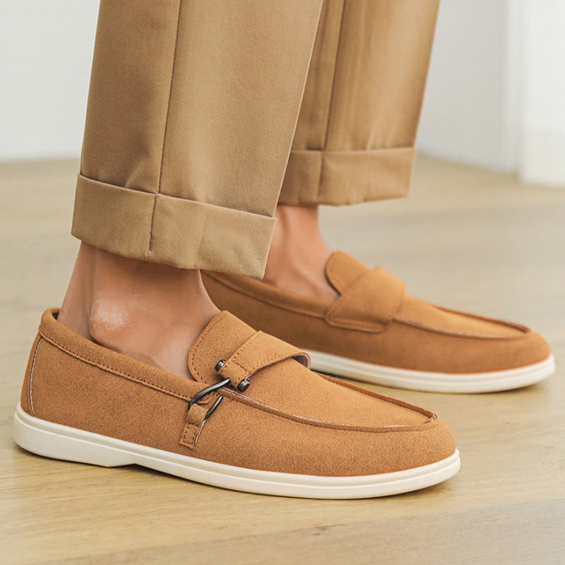 Stylish men's black slip-on loafers, an everyday shoe essential for men's footwear