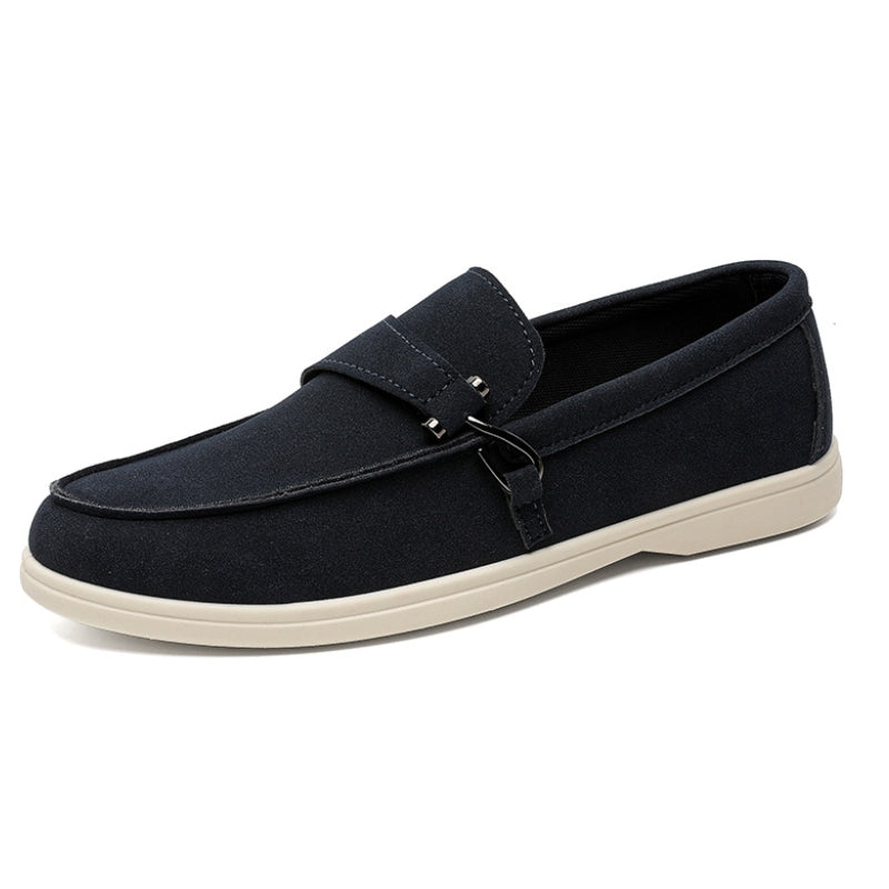 Collection of men's slip-on loafers in different colors, showcasing variety in casual shoes