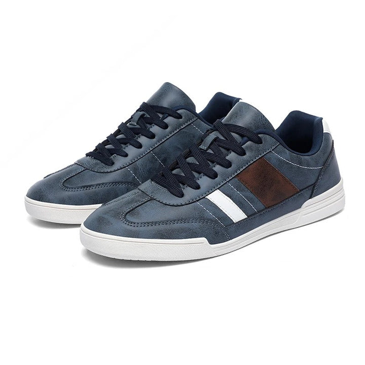 Urban gray men's fashion sneakers, a classic and comfortable choice for everyday casual shoes.