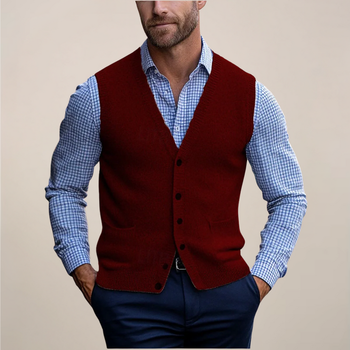 Stylish men's buttoned knit vest in a solid color, ideal for spring fashion and smart layering.