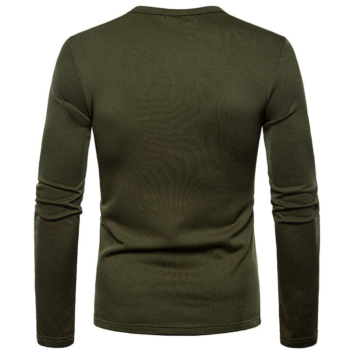 Model wearing a men's cotton blend V-neck t-shirt, showcasing fit and casual style.
