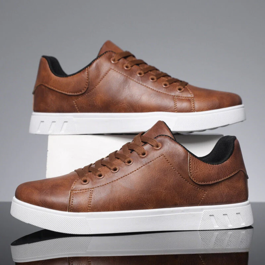 Everyday men's fashion low top sneakers in a classic lace-up design for comfort.
