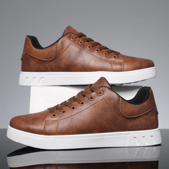 Everyday men's fashion low top sneakers in a classic lace-up design for comfort.
