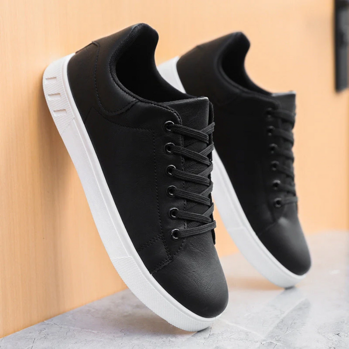 Stylish men's lace-up low top sneakers, ideal comfort footwear for casual outings.