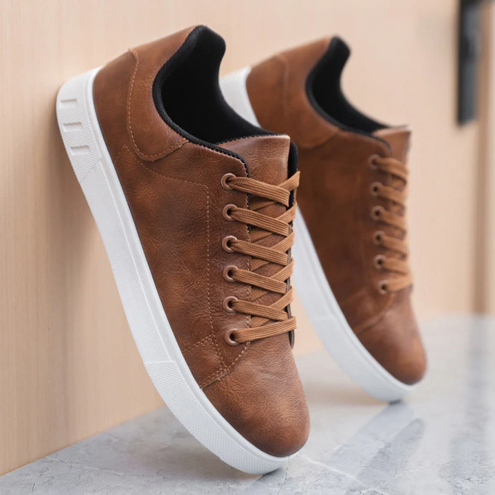 Durable men's lace-up low top sneakers, offering comfort and timeless casual style.