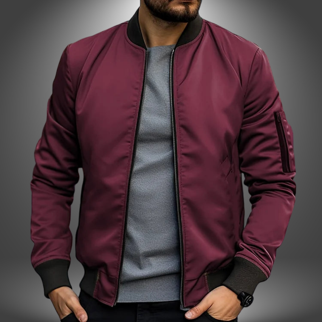 Detail of pockets and zipper on a classic men's windproof bomber jacket, practical & stylish.