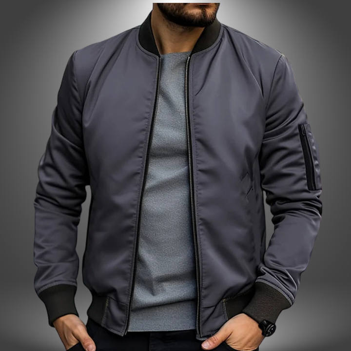 Back view of a classic men's windproof bomber jacket, showcasing its clean lines & comfortable fit.