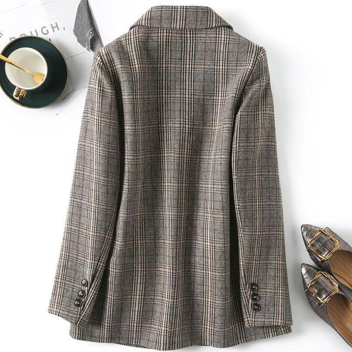Classic style men's blazer, featuring a sophisticated plaid pattern & comfortable wool blend fabric.
