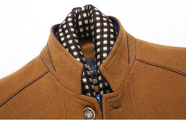 Fashionable men's outerwear: gray wool cashmere blend winter coat with a removable scarf.