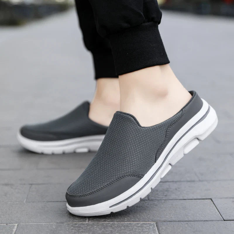 Simple, comfortable men's closed-toe slip-on mule sandals for effortless casual and everyday fashion.