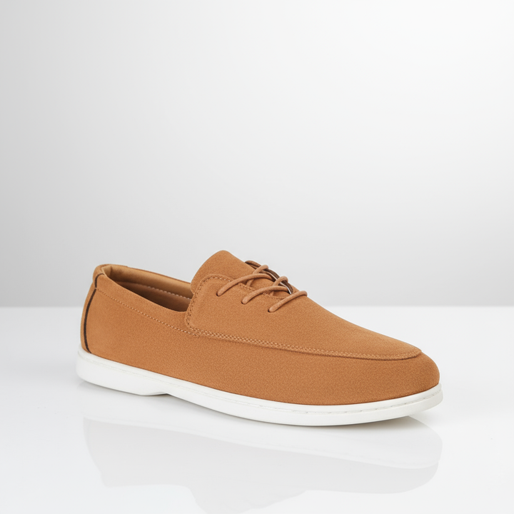 Man wearing Men's Cloud Comfort Suede Loafers with jeans, ideal casual footwear