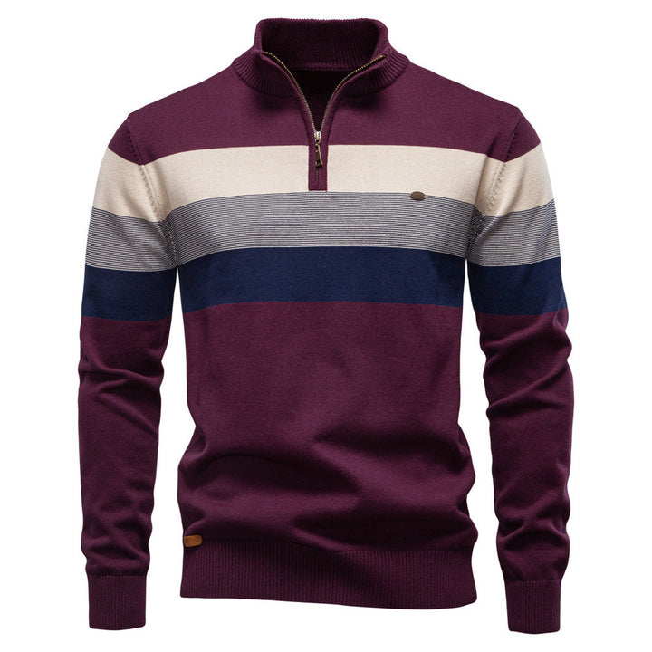 Detailed shot of the half-zip closure on a men's colorblock pullover, quality zipper