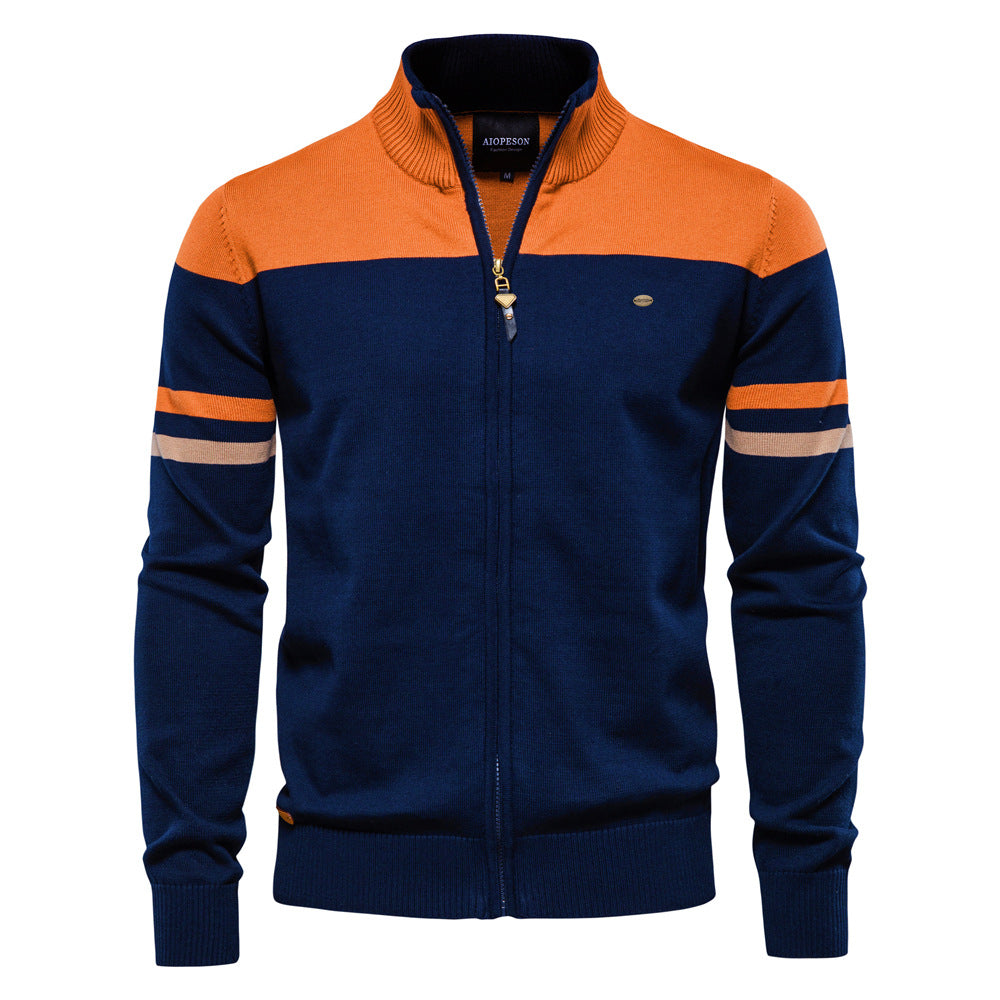 Full length shot of a man modeling a comfortable colorblock zip-up cardigan sweater.