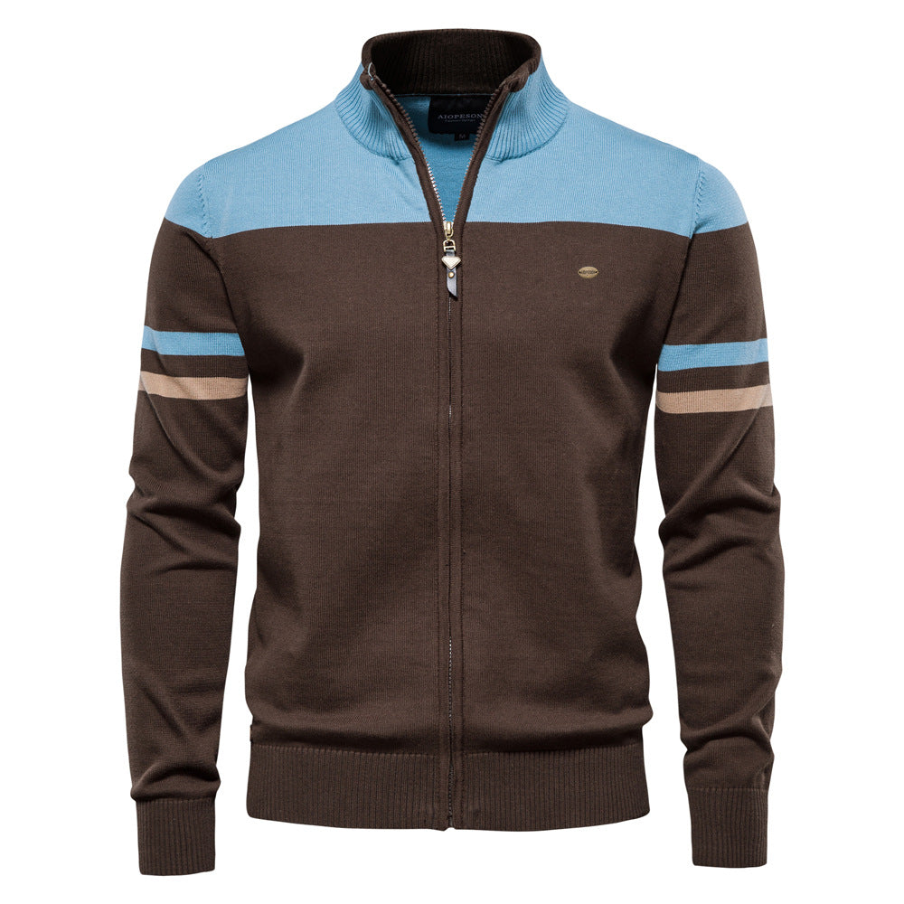 Men's fashion: colorblock zip-up cardigan sweater paired with a t-shirt, casual and stylish.