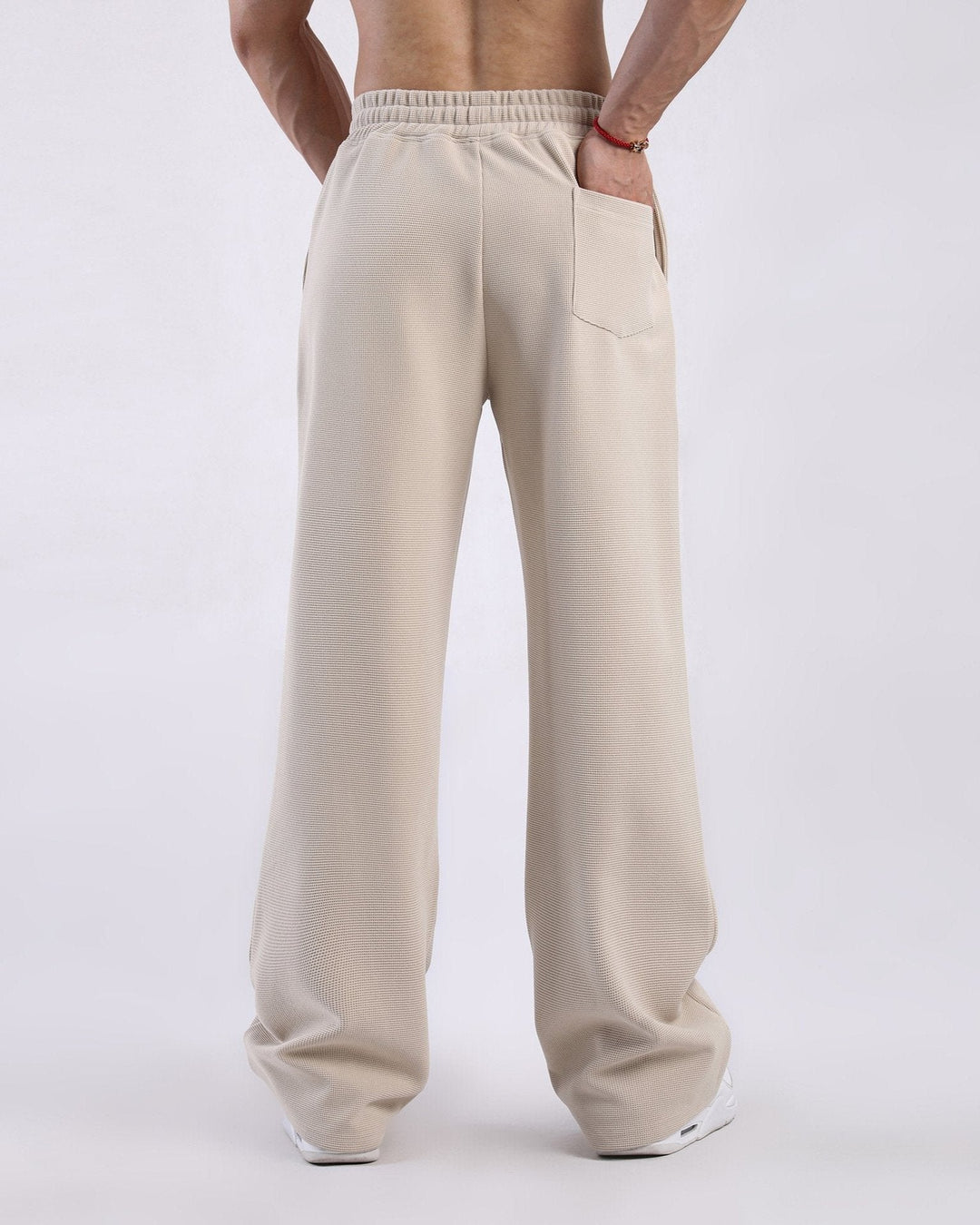 Front view of men's gray waffle knit sweatpants, perfect for loungewear