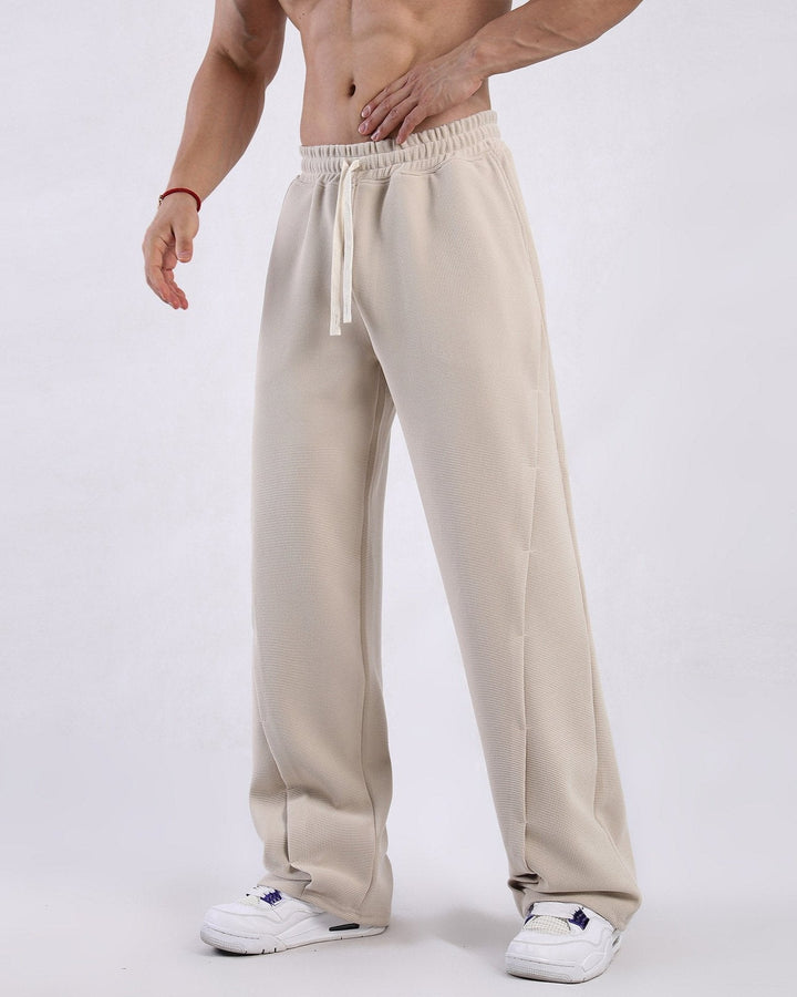 Folded men's waffle knit sweatpants, showcasing soft cotton blend fabric