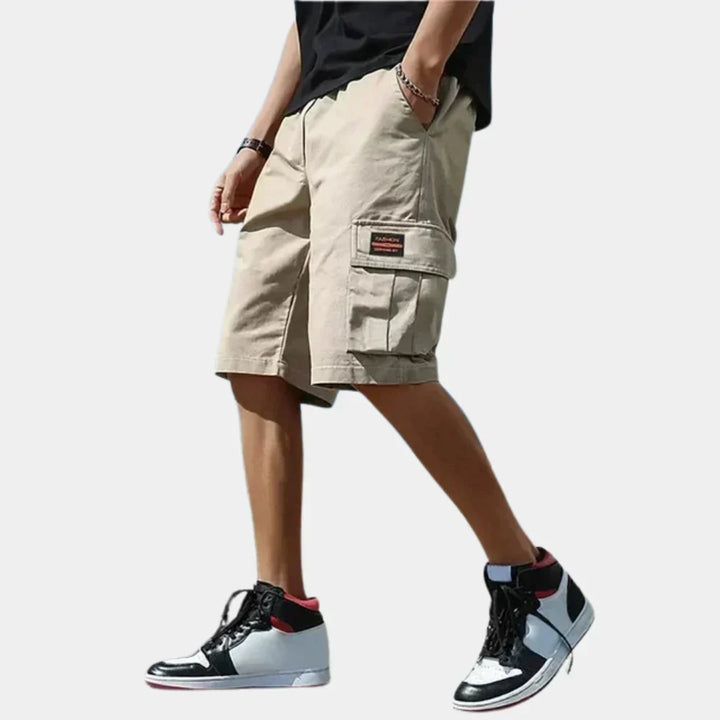 Men's comfortable cotton cargo shorts, ideal for summer outdoor adventures.