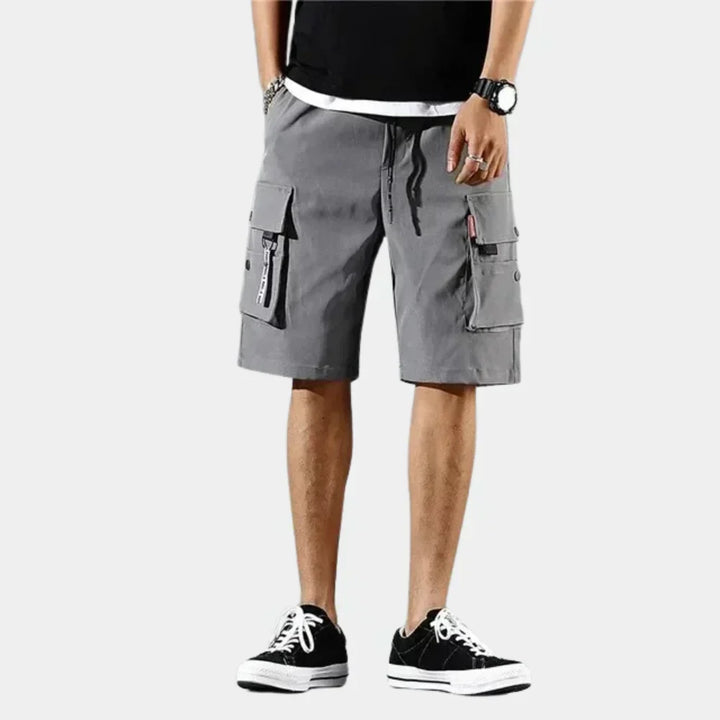 Comfortable men's relaxed fit cargo shorts, great for summer, featuring a drawstring waist.