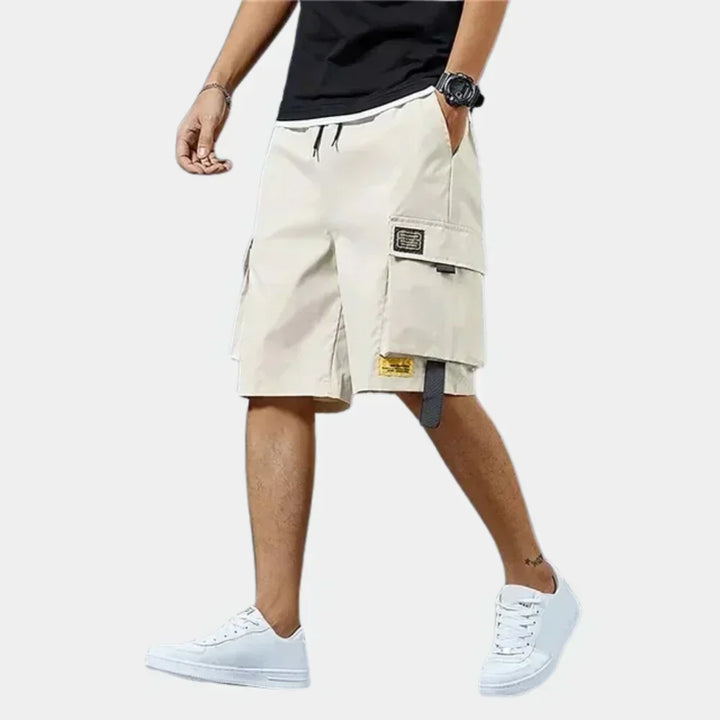 Men's multi-pocket cargo shorts, ideal for summer adventures, offering practical storage and comfort.