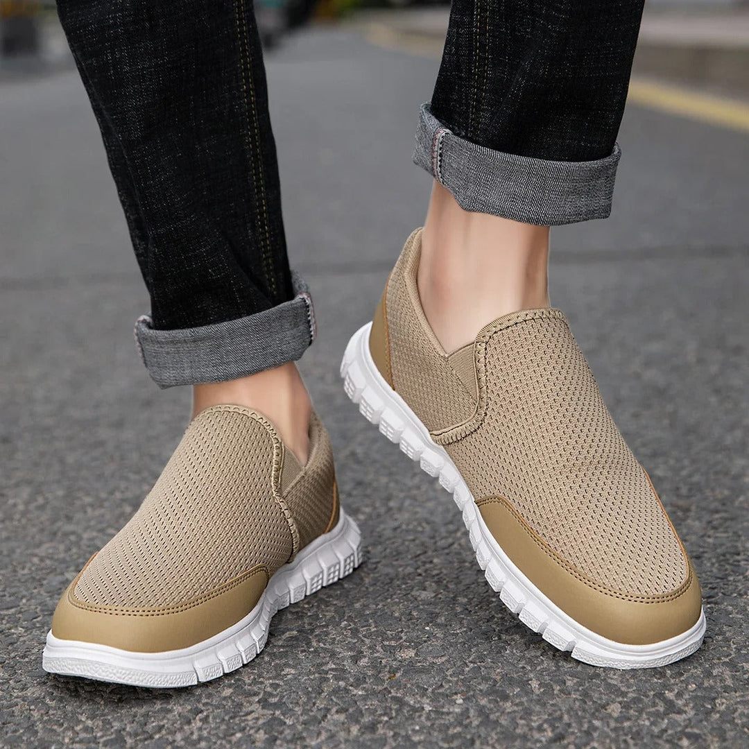 Close-up of the knitted texture on men's slip-on loafers in a khaki color, highlighting breathability.