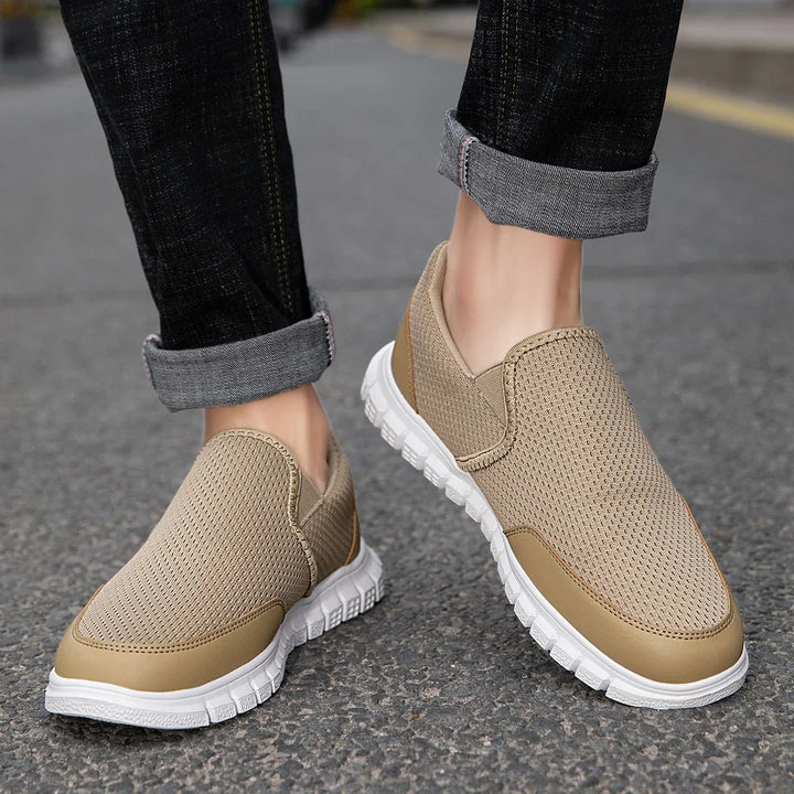 Close-up of the knitted texture on men's slip-on loafers in a khaki color, highlighting breathability.