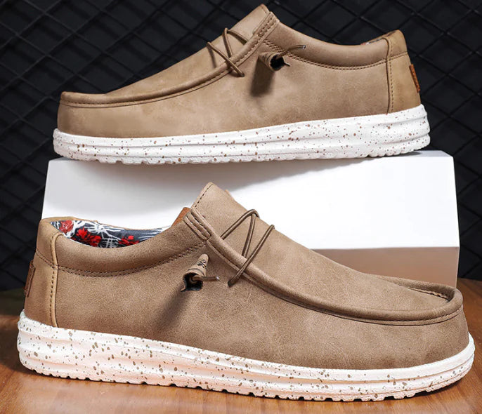 Men's comfortable slip-on loafers, ideal for casual wear, showcasing breathable design and lightweight construction.