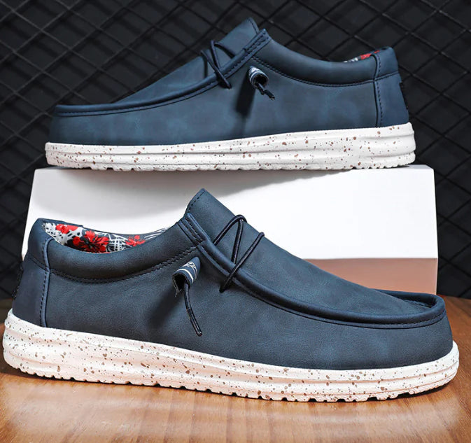 Premium comfort men's slip-on loafers, perfect for daily wear, featuring a casual yet stylish look in a neutral tone.