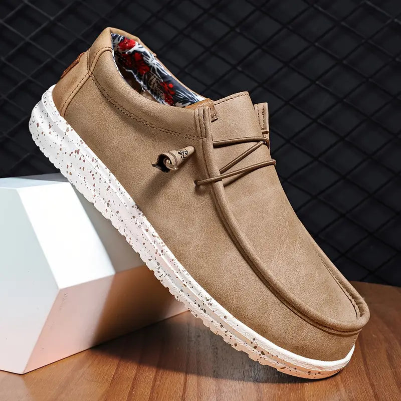 Mens fashion slip-on loafers, emphasizing premium comfort and a versatile design suitable for daily activities.