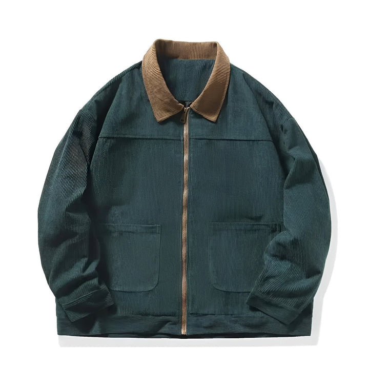 Close-up of the textured corduroy fabric on a men's zip-up jacket, highlighting its fall fashion appeal.