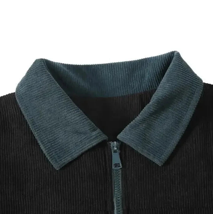Detail of the zipper and ribbed cuffs on a men's casual corduroy jacket, a key piece for fall.