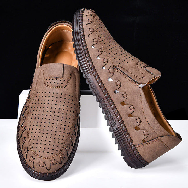 Stylish men's slip-on loafers in cowhide leather, perfect for comfortable daily wear.
