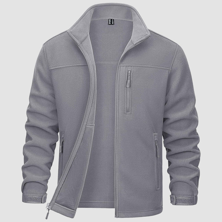 Durable men's blue fleece zip-up, essential layering piece for men